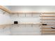 Spacious closet with built-in wooden shelves and ample storage at 130 Cherokee Rd # 304, Charlotte, NC 28207