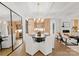 Elegant dining room featuring a round table and contemporary lighting at 130 Cherokee Rd # 304, Charlotte, NC 28207