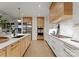 Sleek kitchen featuring a large island and stainless steel appliances at 130 Cherokee Rd # 304, Charlotte, NC 28207