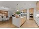 Open concept kitchen with a large island and hardwood floors at 130 Cherokee Rd # 304, Charlotte, NC 28207