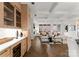 Open living area with hardwood floors and access to balcony at 130 Cherokee Rd # 304, Charlotte, NC 28207