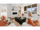 Elegant living room with white sofas and a modern fireplace at 130 Cherokee Rd # 304, Charlotte, NC 28207