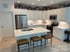 Modern kitchen with white cabinets and island at 1330 Millview Ln, Matthews, NC 28104
