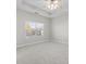 Spacious bedroom with large window and carpet flooring at 15430 Jade St, Charlotte, NC 28277