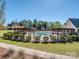 Community pool with pergola and landscaping at 18015 Flowering Oak Ct, Charlotte, NC 28278