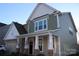 Two-story home with stone accents and a covered porch at 2006 Houle Ln, Charlotte, NC 28214