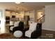 Open living area with kitchen and staircase views at 2006 Houle Ln, Charlotte, NC 28214