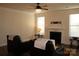 Spacious living room features a fireplace and neutral color palette at 2006 Houle Ln, Charlotte, NC 28214