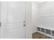 Mudroom entrance with built-in bench and cubbies, offering storage and convenience at 2006 Houle Ln, Charlotte, NC 28214