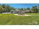 Riverbend Swim Club with gated entry and landscaping at 2006 Houle Ln, Charlotte, NC 28214