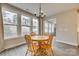 Bright dining area with wood table and chairs, overlooking backyard at 2024 Suttonview Rd, Fort Mill, SC 29708