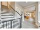 Modern staircase with gray and white railings, leading to the second floor at 2024 Suttonview Rd, Fort Mill, SC 29708