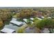 Aerial view showcasing multiple boat slips and a picturesque waterfront community surrounded by mature trees at 203 Riverview Ter, Clover, SC 29710