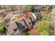 An aerial view of townhomes, showcasing roof lines, surrounding landscape and parking at 203 Riverview Ter, Clover, SC 29710