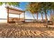 Community beach area featuring a gazebo, picnic tables, and a sandy shoreline for relaxation and recreation at 203 Riverview Ter, Clover, SC 29710