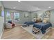 Spacious bedroom featuring two twin beds, chair, and natural light at 203 Riverview Ter, Clover, SC 29710