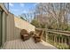 Cozy deck featuring wicker chairs, a small table, and a peaceful outdoor view at 203 Riverview Ter, Clover, SC 29710