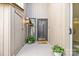 Close-up of front door with potted plants and inviting decor at 203 Riverview Ter, Clover, SC 29710