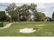 Beautiful golf course view showcasing lush green fairway, mature trees, and meticulously maintained landscaping at 203 Riverview Ter, Clover, SC 29710