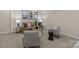 Comfortable living room featuring a sofa, armchairs, and neutral decor at 203 Riverview Ter, Clover, SC 29710