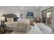 Inviting main bedroom with a plush bed, stylish decor, and sliding glass door at 203 Riverview Ter, Clover, SC 29710