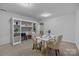 Bright office with built-in shelving, a desk, and two patterned chairs at 203 Riverview Ter, Clover, SC 29710