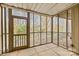 Screened sunroom perfect for enjoying nature with fresh air at 203 Riverview Ter, Clover, SC 29710
