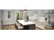 Bright and airy kitchen with stainless appliances, a large center island, and modern decor at 2526 Park Rose Ln # 13, Charlotte, NC 28204