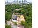 Drone shot of new townhomes being constructed, set against a backdrop of the Charlotte skyline at 2538 Park Rose Ln # 10, Charlotte, NC 28204