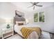 Cozy bedroom featuring a comfortable bed, stylish décor, and a bright window view at 2542 Park Rose Ln # 9, Charlotte, NC 28204