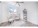 Serene bedroom featuring bright light, neutral tones, ceiling fan and space for multiple sitting options at 2542 Park Rose Ln # 9, Charlotte, NC 28204