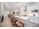 Open concept kitchen with a large center island, pendant lighting, and modern stainless steel appliances at 2542 Park Rose Ln # 9, Charlotte, NC 28204