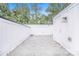 Expansive rooftop patio offers an open-air space for entertaining and relaxation with white privacy fencing at 2542 Park Rose Ln # 9, Charlotte, NC 28204