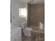 Updated bathroom with tile shower and white vanity at 303 Vance Ave, Salisbury, NC 28144