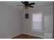 Small bedroom with dark hardwood floors and a ceiling fan at 303 Vance Ave, Salisbury, NC 28144