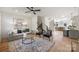 Open concept living room and kitchen with hardwood floors and stylish furnishings at 3113 Colyer Pl, Charlotte, NC 28205