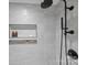 Sleek shower with black fixtures and built-in shelves at 3113 Colyer Pl, Charlotte, NC 28205