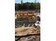 New construction framing showing the two-story structure's dimensions and layout on a cleared lot at 4251 Candlewood Dr, Sherrills Ford, NC 28673