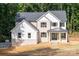 Stunning two-story home with a dark roof, brick exterior and light-colored siding at 4251 Candlewood Dr, Sherrills Ford, NC 28673