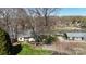 Scenic lake house surrounded by mature trees and landscaping, offering a serene and private retreat at 4251 Candlewood Dr, Sherrills Ford, NC 28673