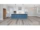 Open kitchen featuring a blue island, recessed lighting, and modern appliances at 4251 Candlewood Dr, Sherrills Ford, NC 28673