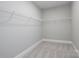 A walk-in closet with carpeted floors and built-in shelves at 4251 Candlewood Dr, Sherrills Ford, NC 28673