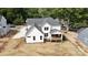 Bright two-story home with white siding, gabled roof, and a charming rear deck for relaxing at 4257 Candlewood Dr # 7, Sherrills Ford, NC 28673