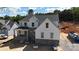 New two story construction with stone accents, white siding, and a covered front porch at 4257 Candlewood Dr # 7, Sherrills Ford, NC 28673