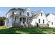 Beautiful two-story home with a stone foundation, covered porch, and lush green lawn at 4257 Candlewood Dr # 7, Sherrills Ford, NC 28673