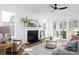 Cozy living room featuring fireplace, neutral furniture, and a sliding glass door to the outdoor patio at 4257 Candlewood Dr # 7, Sherrills Ford, NC 28673