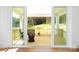 Covered patio view through sliding glass doors offering an outdoor space with peaceful woodland views at 4257 Candlewood Dr # 7, Sherrills Ford, NC 28673