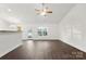 Bright and airy living room with hardwood floors at 5021 Ashley Place Dr, Bessemer City, NC 28016