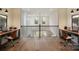 Upstairs open homework center features hardwood floors, dual desks, and great backyard views at 604 Hyder Trl, Tega Cay, SC 29708