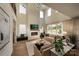 Bright living room with fireplace, soaring ceilings and large windows at 604 Hyder Trl, Tega Cay, SC 29708